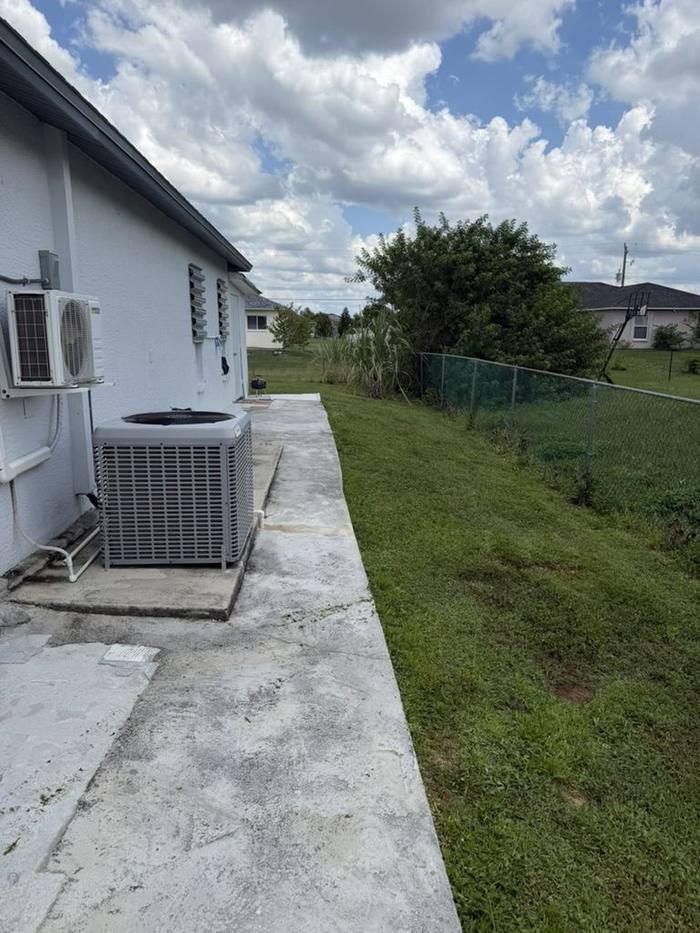 Freshly mowed lawn with clean edges at a Southwest Florida home